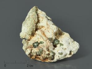 Демантоид (зелёный андрадит), Андрадит, Гранат. Демантоид (кристаллы на породе) в пластиковом боксе, 6,3х5,8х3 см