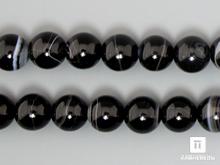Бусины из чёрного агата (чёрного оникса), 38 шт. на нитке, 10-11 мм