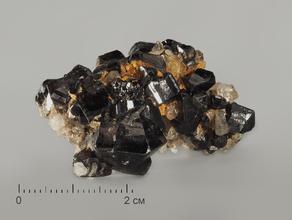 Касситерит с кварцем, топазом, 4х2,8х2,3 см