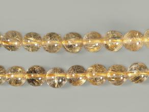Бусины из кварца-волосатика (рутила в кварце), 60-65 шт. на нитке, 6-7 мм