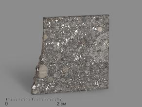 Метеорит Aba Panu, пластина в боксе 3х3х0,1 см (4 г)