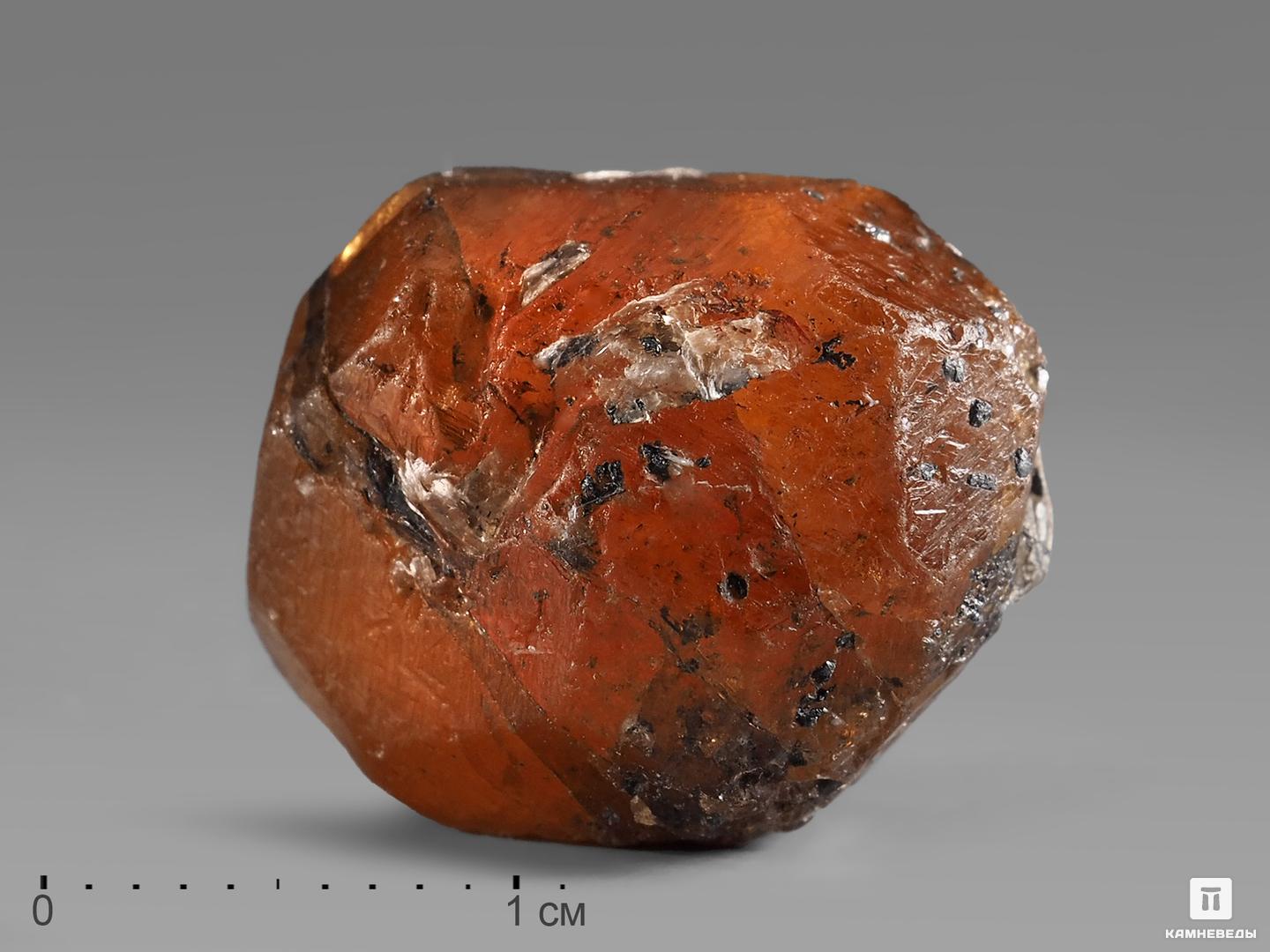 Спессартин (гранат), кристалл в пластиковом боксе 1,6х1,3х1,2 см
